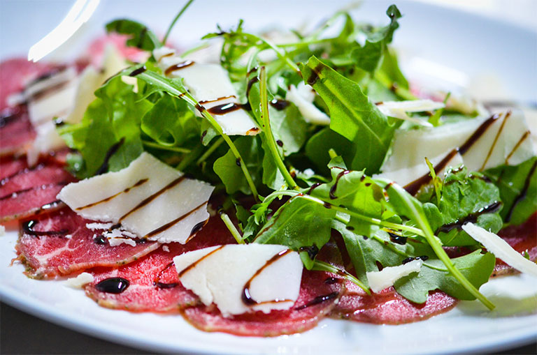 Poor Man’s Beef “Carpaccio,” Basil, Balsamic, Goat Cheese, Red Chiles, Garlic, Olive Oil
